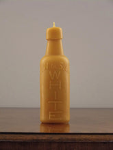Load image into Gallery viewer, beeswax candle in the shape of an antique bottle